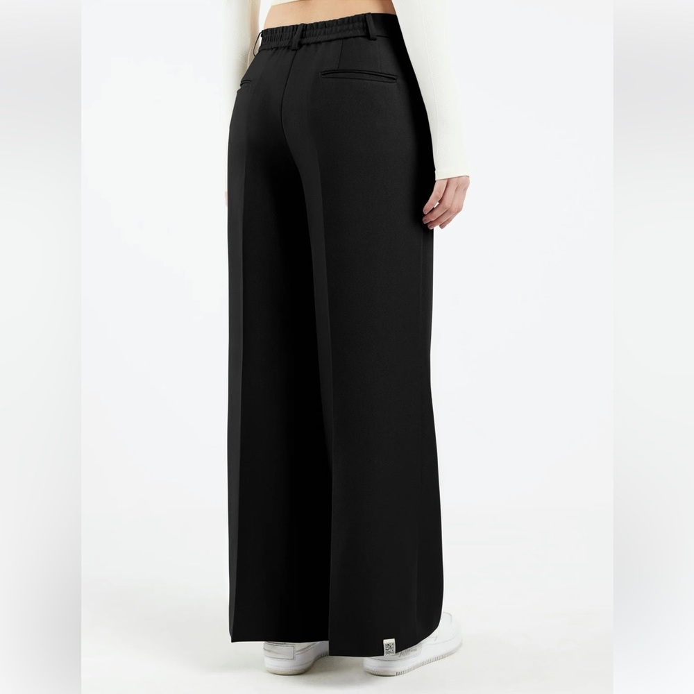 The Giving Movement Wide Pleated Pants